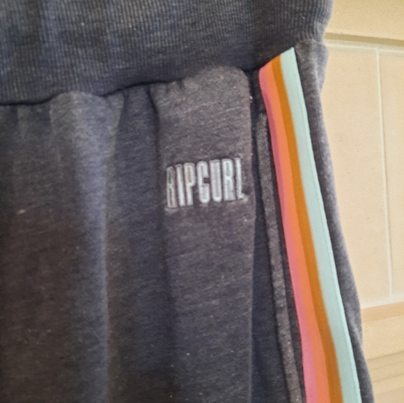 Rip Curl grey distressed joggers with multi color side stripe. - Picture 3 of 5